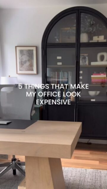 These 5 things took my office from “where the mail pile lives” to a space that feels custom ✨

1️⃣ An arched bookcase
My Arhaus Hattie is the star of the room. The curved top adds architecture to a plain wall, and the natural oak grain keeps it warm instead of stiff. One statement piece like this does more than a bunch of small decor.

2️⃣ A statement chandelier
Look-for-less chandeliers are so easy to find now thanks to Amazon. Warm, layered lighting instantly makes a room feel more expensive.

3️⃣ A vintage rug
A rug grounds the desk area and adds softness, so the office feels finished instead of just functional. It also pulls the colors and textures together.

4️⃣ A modular fireplace
No construction, no chimney, no contractor. A modular fireplace adds a real focal point and that cozy, built-in look you usually only get with a renovation. It’s the piece that makes people ask “wait, was that always there?” 🔥

5️⃣ Styled details
Books, a vase, a little greenery. Fewer, better pieces with room to breathe always look higher-end than a crowded shelf.

Which one would you try first? 👇

🛍️ Comment OFFICE and I’ll send you the links

#homeofficedecor #homeofficeinspo #arhaus #officemakeover #organicmodernhome