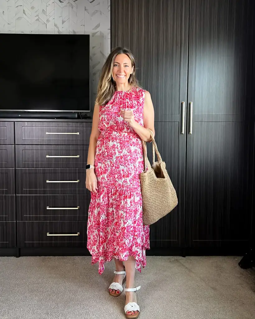 IMG_7966 2 - Sweet Motherly A woman standing in front of a closet wearing a pink floral dress.