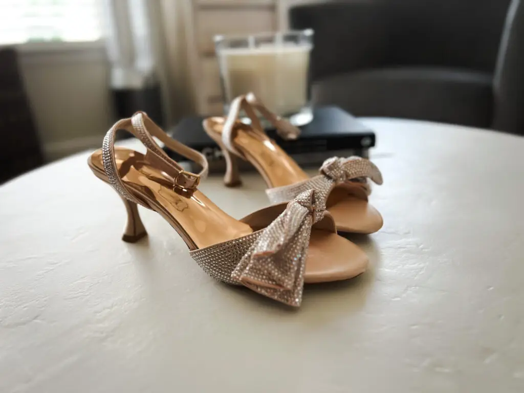 20-Affordable-Wedding-Guest-Dresses-for-Fall - Sweet Motherly A pair of shoes sitting on top of a table.