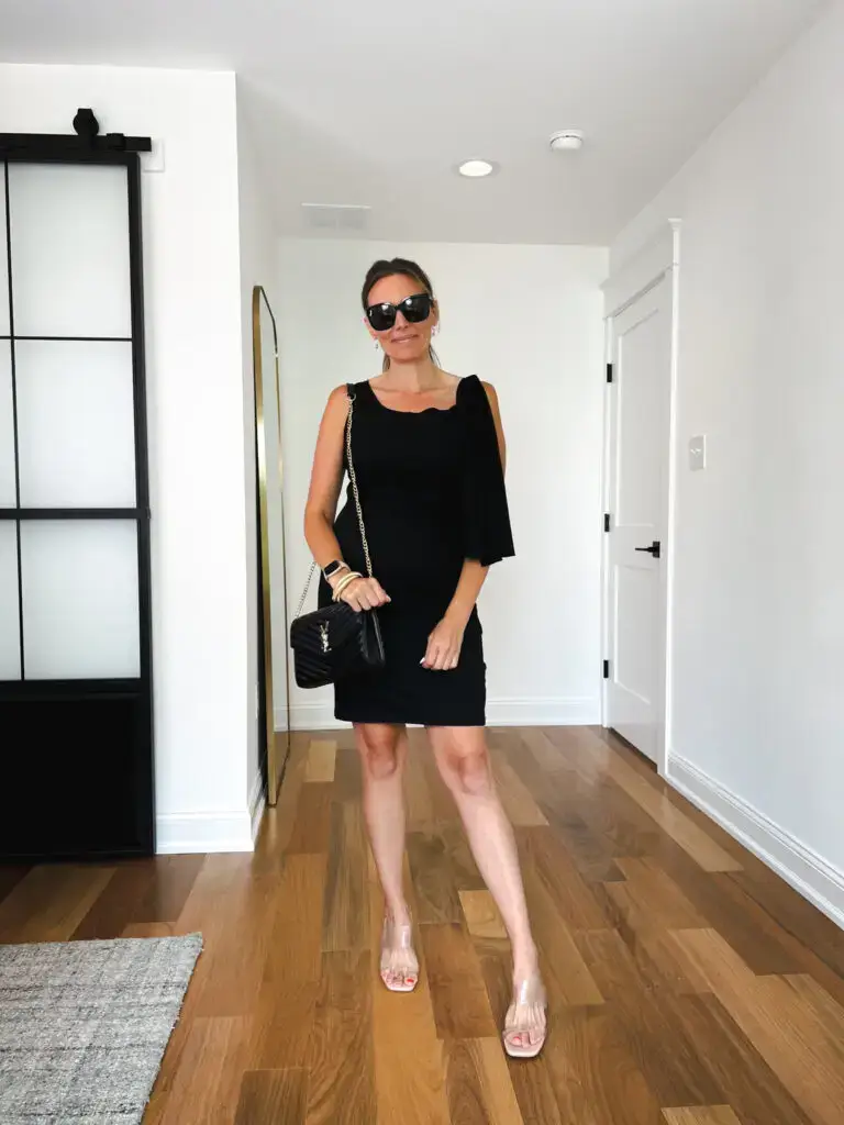 20-Affordable-Wedding-Guest-Dresses-for-Fall - Sweet Motherly A woman in black dress standing on the floor.