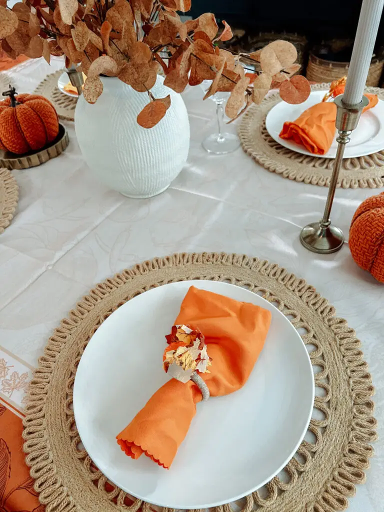 Simple-Thanksgiving-Table-Settings-and-Decor - Sweet Motherly A table set with plates and napkins on it.