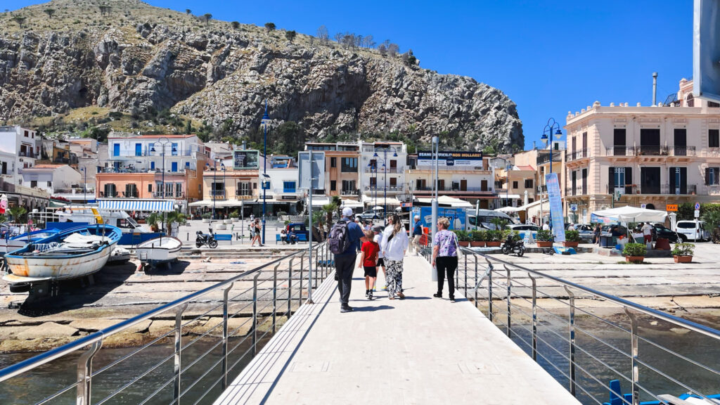 Starting our CruiserCar tour with a walk along the Palermo harbor, surrounded by boats, locals, and sunshine.