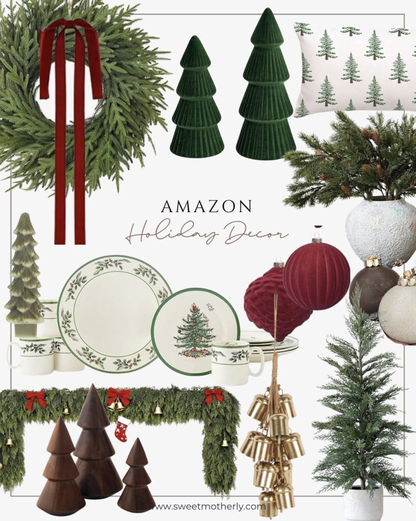 Flatlay of Amazon holiday decor with evergreen wreath and red ribbon, velvet tabletop trees, tree-patterned pillow, faux greenery arrangement, Christmas dinnerware set, wood tree figurines, hanging brass bells, assorted holiday ornaments, cedar garland, and small potted Christmas tree.