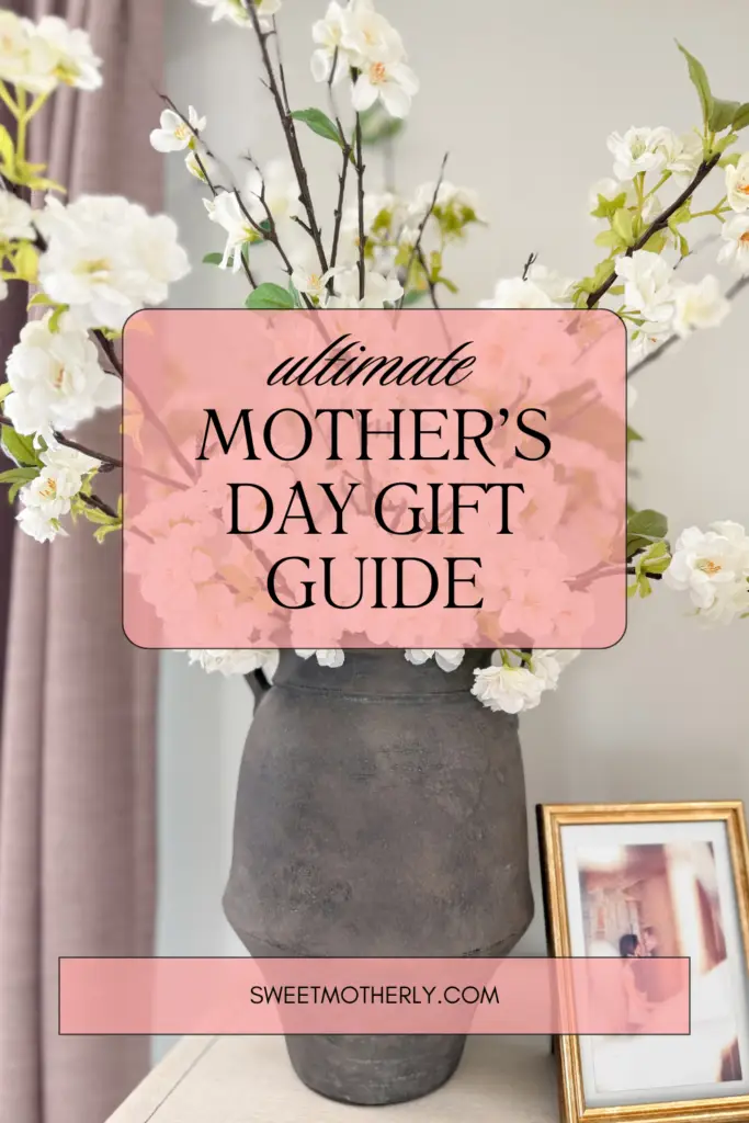 Banner image announcing the ultimate Mother's Day Gift Guide over a pink translucent plaque on a vase with white blossoms, site: sweetmotherly.com